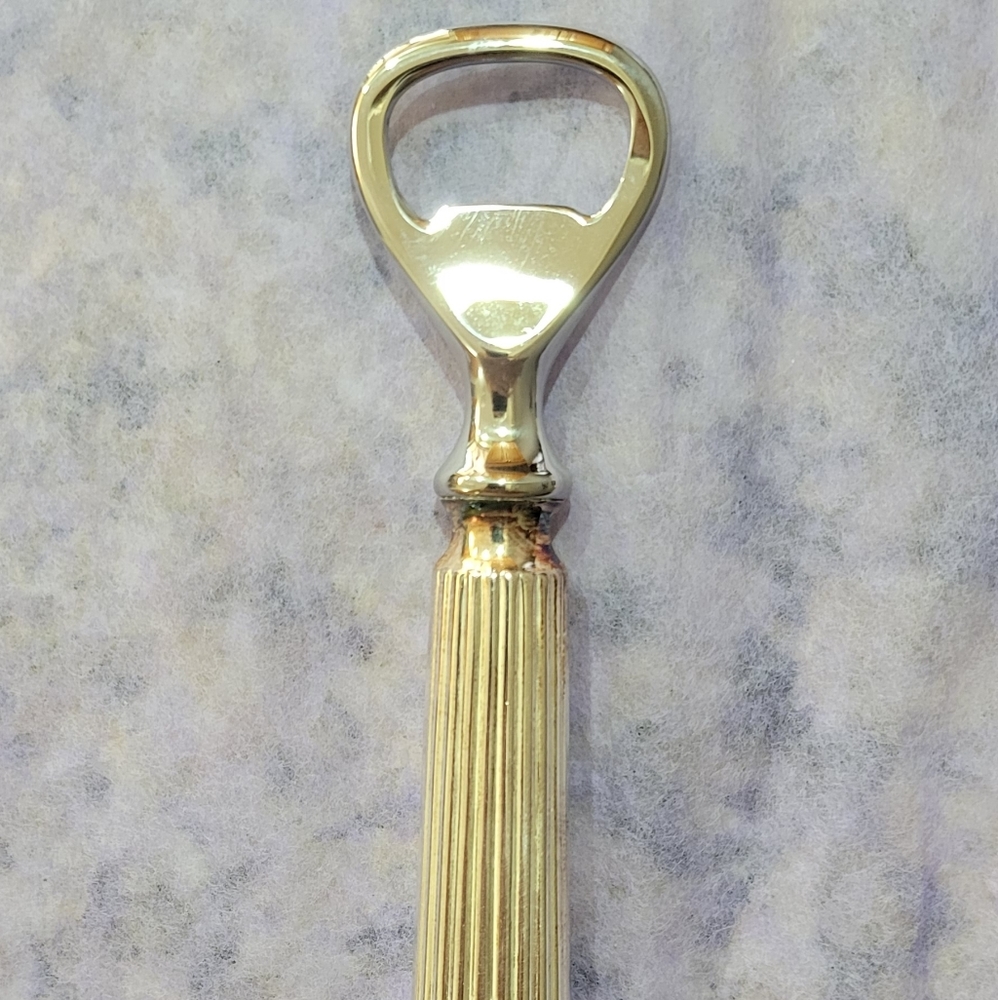 Vintage Sheffield England stainless bottle opener